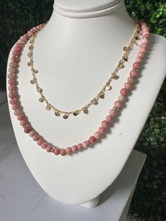 Most elegant selection of genuine, natural gemstones and 14k gold filled beads makes this  rcklace a wonderful gift for any jewelry lover.  MATERIALS * genuine pink petrified rhodonite beads round 4mm * 14k gold filled spacers beads  * 14k gold filled closure  SIZE 15inch If you need a different size or would like a custom order feel free to contact me. I would be more than happy to make it for you. Due to the unique nature of each stone, your item may vary slightly from the picture shown.  CARE To enjoy beautiful jewelry for a long time allow perfumes and lotions dry before wearing. Earthy Pink, Pink Beaded Necklace, Pink Rhodonite, Unique Nature, Waterproof Jewelry, Jewelry Lover, How To Make Beads, Spacer Beads, Chain Styles