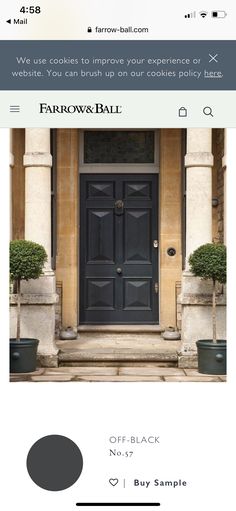 a black front door with the words farrow and ball on it