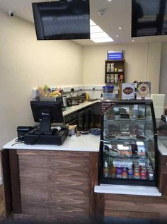 an empty counter in a restaurant with food on it