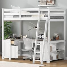 a white bunk bed sitting next to a desk