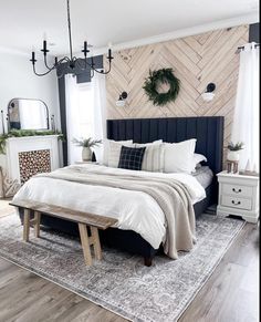 a dog laying on top of a bed in a bedroom