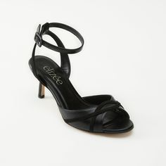 With ultra-feminine, sculpted lines and an adjustable ankle strap for a bespoke fit, the Aria sandal is set on a perfectly balanced 60mm mid-heel, ideal for all day wear. Seductively elegant and timelessly designed, with a flattering pattern thoughtfully placed to follow the line of the foot, this modern classic is equally at home with cropped jeans to a silk evening dress. Color - Black Heel Height - 60 mm Material - Soft Nappa Insole - Plush Contour Handmade in Italy Silk Evening Dress, Ultra Feminine, Black Heel, Mid Heel, Soft Black, Nappa Leather, Black Heels, Modern Classic, Black Sandals