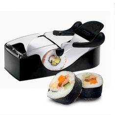 a sushi maker with two pieces of sushi in it