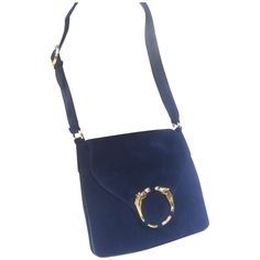 Gucci Rare midnight blue suede equine emblem shoulder bag c 1970s The luxurious gucci handbag is covered with plush doeskin suede Adorned with a sleek gilt metal horse head medallion The interior is lined in dark blue leather designed with a zippered compartment. Stamped in gold lettering: Made in italy by Gucci Paired with Gucci's signature gilt metal knight pull tab charm Purse Outfit, Metal Horse, Gucci Handbag, Gucci Shoulder Bag, Gucci Handbags, Horse Head, Blue Suede, Leather Design, Blue Leather