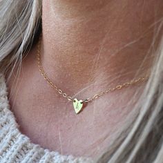 Remember the days of mood rings and initial necklaces!?! That's what this little dainty choker will remind you of. How fierce it is to love yourself so much you wear your own initial and own it! Choose your own initial or make this a gift for your favorite girl. 7mm 14k gold fill heart charm hand stamped with up to one character 14k gold fill cable chain Handmade in Arizona Necklace size guide Size 14" will typically be a choker style. Please use the size guide to confirm your length. Hypoallergenic Charm Necklaces With Initial Pendant, Everyday Tiny Initial Pendant Charm Necklace, Simple Tiny Initial Pendant Charm Necklaces, Simple Tiny Initial Pendant Charm Necklace, Minimalist Adjustable Charm Necklace With Heart Pendant, Minimalist Heart Charm Jewelry For Best Friend Gift, Minimalist Heart Charm Jewelry For Best Friend, Heart Shaped Jewelry For Best Friend, Minimalist Jewelry With Heart Charm For Best Friend Gift