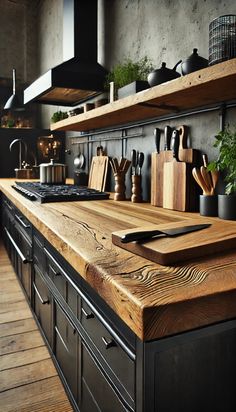 a kitchen with wooden counter tops and black cabinets