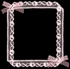 a white lace frame with pink bows