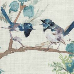 two birds are sitting on a branch with leaves and branches in the background, one is blue