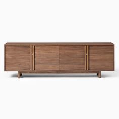 the sideboard is made from wood and has three doors