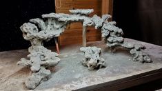 some kind of rock structure on a table