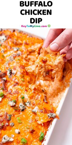 a hand dipping a tortilla chip into a casserole dish with text overlay