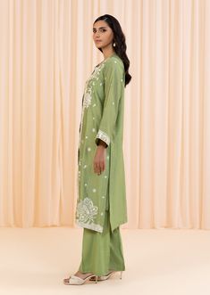 2 Piece - Embroidered Suit Make a bold statement with this 2-piece green dress, crafted from a combination of silk cotton net and viscose raw silk, with intricate embroidery for added texture and style. The full-sleeved jacket features a crew neckline, plain back, and embroidered border, while the trousers feature a boot cut design. Perfect for any occasion, this dress will be sure to turn heads. 2-Piece Front Open Jacket with TrousersMake a fashionable statement in green front open jacket featu Designer Green Kurta For Spring, Festive Green Kurta With Floral Embroidery, Green Cotton Silk Kurta With Chikankari Embroidery, Spring Cotton Silk Kurta With Zari Work, Pista Green Silk Kurta For Spring, Pista Green Long Sleeve Silk Kurta, Embroidered Cotton Silk Kurta For Summer, Embroidered Green Cotton Silk Kurta, Green Embroidered Cotton Silk Kurta