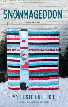 the cover of snowmagegeddon magazine, featuring a quilted wall hanging in front of