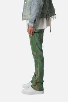 the B451 Star Flare Denim are designed with our new B fit, which is slim through the thigh and features a slight flare at the leg opening and is constructed from washed olive denim, work pants panelling removed after wash for contrasting wash area, contrast panelling at the inseam and outseam for a slight flare, leg openings have a deconstructed hem, and finished with olive and tan star patches throughout. details flare at leg opening 100% cotton model is 6’1, 140 lbs and wears a size 30 Contrast Panelling, M65 Jacket, Star Patches, Unique Jeans, Layered Hoodie, Wardrobe Styling, 140 Lbs, Fuzzy Cardigan, Fun Pants