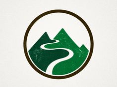 a road in the middle of a mountain with a circle around it that has a green and brown logo