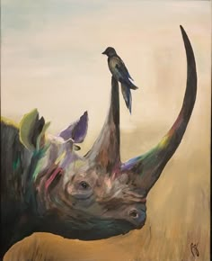 a painting of a rhino with a bird on it's back