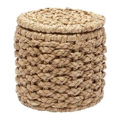 three woven baskets stacked on top of each other, one is brown and the other is beige