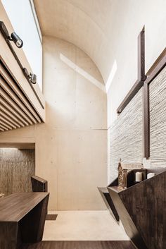 the interior of a modern bathroom with wood accents