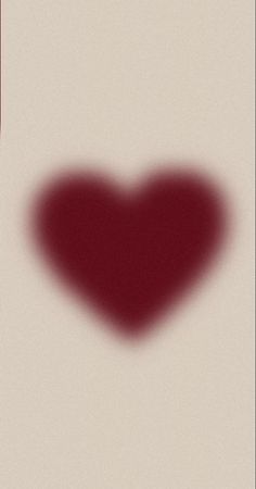 a red heart shaped shadow on a white background