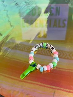 Be the coolest kid at the rave/ party/ festival with this clever bracelet with Special Kandi spoon bead! Colors, designs, and length can be customized. Stickers and gum flavors will be randomly chosen. Dm for preferences Customized Stickers, Rave Kandi, Gum Flavors, Rave Party, Party Festival, Bead Bracelet, Gift Registry, Cool Kids, Gum