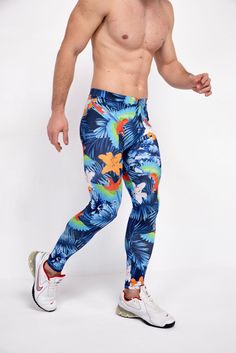 Description: Blue Jungle Print Men's Leggings Breathable & Moisture Wicking 4-Way Stretch Fabric Machine Wash Cold, Quick Drying High Stretch Nylon / Spandex Bolt Logo Patch This design does not have pockets Model is 6’2’’ (189cm) tall, 34’’ (86cm) waist and wears size Large. Blue 4-way Stretch Bottoms For Outdoor, Blue Sportswear Pants For Running, Blue Compression Bottoms For Outdoor, Blue Stretch Pants For Outdoor, Casual Blue Running Pants, Blue Sports Pants For Summer, Blue Activewear For Outdoor With 4-way Stretch, Blue Athleisure Pants For Outdoor, Full-length Blue Running Pants