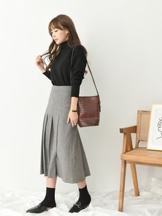 Pleated wool blend skirt, midi length. Model is in MINUSEY S. Please allow 5-12 days to ship when in restocking. * MINUSEY S = EU 34, US 2* MINUSEY M = EU 36, US 4* Wool Blend* Dry clean* Made in Korea - Model Height: 163cm/5'3" (US2, EU34) Fall Office Midi-length Pencil Skirt, Winter Workwear Pleated Skirt, Wool Midi Skirt For Workwear, Wool Pleated Office Skirt, Long Wool Skirt For Workwear, Winter Workwear Pleated Midi Skirt, Wool Long Skirt For Workwear, Midi Length Bottoms For Office In Fall, Midi Length Bottoms For Workwear In Fall