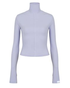 DETAILS: Color: Lavender Ribbed mock neck pullover Long sleeve Thumbholes at cuffs Design seam at front 95% Tencel, 5% Spandex Machine wash SIZE & FIT: Fits true to size Front length: 18" Bust: 13 3/4" Lavender Top For Layering In Fall, Lavender Top For Fall Layering, Lavender Tops For Fall Layering, Purple Stretch Top For Winter, Purple Stretch Tops For Winter, Purple Stretch Winter Tops, Stretch Purple Tops, Fitted Lavender Tops For Fall, Stretch Purple Elastane Tops