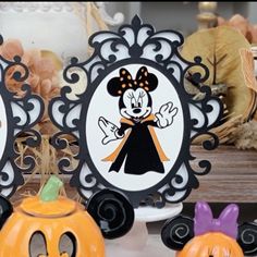 halloween decorations with mickey mouse and pumpkins