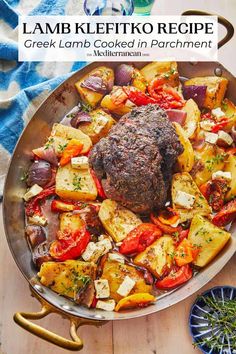 lamb kefto recipe in a pan with potatoes and tomatoes