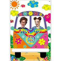 two people in a van with peace love and flowers on the front, one is wearing glasses