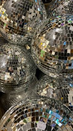 several disco balls are stacked on top of each other