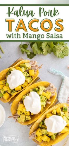 three tacos with avocado and sour cream on top