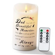 a candle with a remote control next to it that says, dad you let me beautiful memories