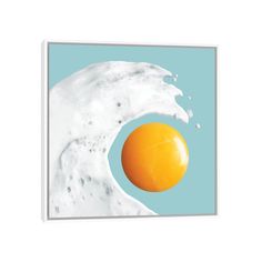 an egg is in the middle of a white and blue background with water splashing on it