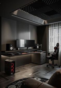 a room that has some speakers and a desk in it with a computer on it