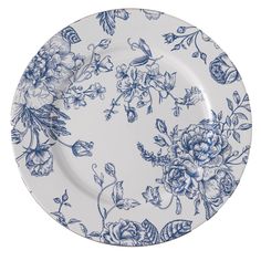 a blue and white plate with flowers on it