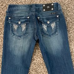 Miss Me Angel Wing Jeans These Make Your Look Amazing Like Brand New Miss Me Jeans Angel Wings, Miss Me Jeans 2000s, Miss Me Bootcut Jeans, Miss Me Jeans Cross, Miss Me Jeans Rhinestones, Miss Me Jeans, Miss Me, Jeans Color, Boot Cut