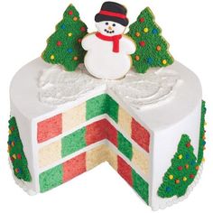 a decorated cake with a snowman on top