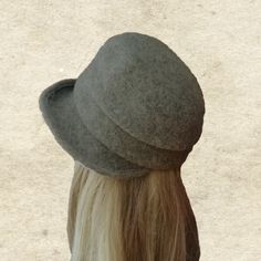 "This felted wool cloche hat is very warm. It's perfect to wear in fall/winter seasons. The hat is lightweight and easy to wear. It's well match with any outfits. One size fits most an average women's head (21.5\" - 22.5\") Composition: 100% Wool Hand wash in cold water and lay flat to dry. Do not use a dryer! NOTE Actual color may slightly different depending on your monitor. Please contact us if you have any questions for the color." Winter Brimmed Felt Hat, Winter Wool Cloche Hat, Winter Wool Cloche Felt Hat, Winter Felt Brimmed Cloche Hat, Winter Felt Cloche Hat With Brim, Brimmed Felt Cloche Hat For Winter, Fitted Gray Wool Hat, Winter Felt Hat One Size, Winter Felt Hat With Short Brim