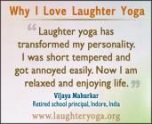 an image of a woman doing yoga on her cell phone with the caption, why i love laughter yoga?