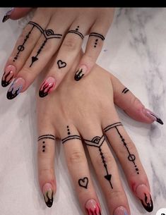 two hands with different designs on them