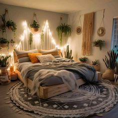 a bedroom with plants and lights on the wall