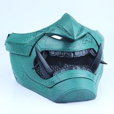 The mask is a nod towards ancient Japanese mythical figures, the Oni, updated for the modern age with a half-face design and cyberpunk accents. Details: We have padded the inside of the mask for your facial comfort. The mask can stay on your face for a long time in the activity you use. It does not cause pain on your face and you can breathe comfortably. It is very robust in your activities with its high filling and extra layer thickness. You can adjust it according to your face with its adjustable straps. If you wear glasses, you can use the mask with glasses. Suitable for your cosplay events, Halloween events, festivals, parties, and to wear with your daily outfits. If you'd like to see more japanese-style cyberpunk masks, then head over to our cyberpunk oni mask collection. Cyberpunk Oni Mask, Oni Half Mask, Cyberpunk Oni, Mask With Glasses, Cyberpunk Masks, Style Cyberpunk, Futuristic Helmet, Mask Collection, Kitsune Mask