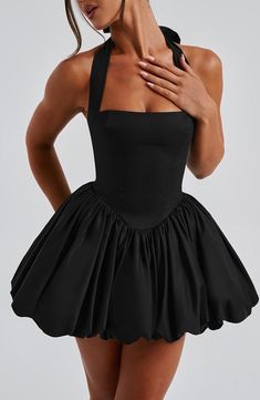 You won't want to miss out on this one, boo! Everyone's new fave mini, the playful Maricia features a square halter neckline with princess seams to the body to ensure a flattering, contoured fit. The puffball skirt adds volume and drama, while the lace up back detail allows you to get your perfect fit.     Colour: Black.  Premium cotton blend fabric.  Fully lined.  Square halter neckline.  Puffball skirt.  Princess seams.  Shirred back panel.  Lace up back.  Invisible zipper fastening.  Mini length.   Size: XS, S, M, L, XL, XXL Short Black Dress Formal, Puffball Skirt, Dress Without Sleeves, Short Black Dresses, Clothing Board, Maxi Dress Sale, Bubble Dress, Fashion Make Up, Halter Mini Dress