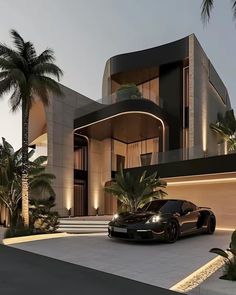 a black sports car is parked in front of a modern house with palm trees and lights