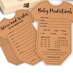 three baby wishes cards in a wooden box next to an envelope with the message,