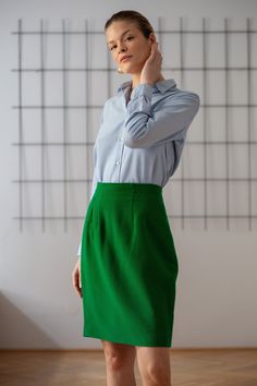 Buy 3 items and get 30% off your entire order. Limited offer. All orders are shipped via FedEx. Shipping to the US typically takes 2 to 3 business days, while within the EU, it takes 2 to 6 business days. Vintage 100% wool pencil skirt in bright grass green colour. It features high waist and above-the-knee length. Back zipper & button closure. Lined. Material: 100% wool Condition: great vintage condition Size: best fits size S (pinned at waist for fit, size on tag: 42) Please compare measurement Green Knee-length Skirt For Formal Occasions, Green Skirt For Spring Workwear, Green Knee-length Skirt For Workwear, Spring Workwear Green Mini Skirt, Green Mini Skirt For Spring Office Wear, Spring Office Green Mini Skirt, Green Mini Skirt For Office, Elegant Green Mini Skirt For Office, Green Spring Office Mini Skirt