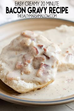 a plate with biscuits covered in gravy on it