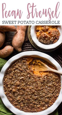 sweet potato casserole in a white dish with a wooden spoon on the side