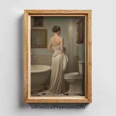 a painting of a woman in a white dress is hanging on the wall next to a toilet